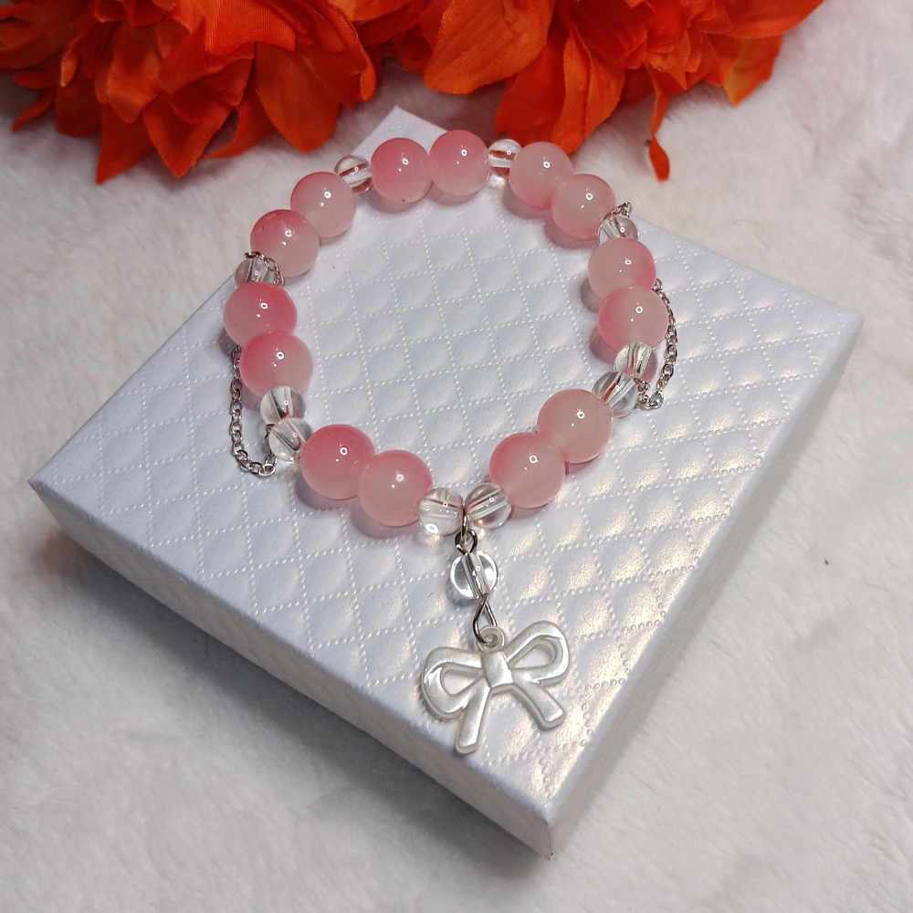 Elegant Pink Beaded Bracelet with Bow Charm